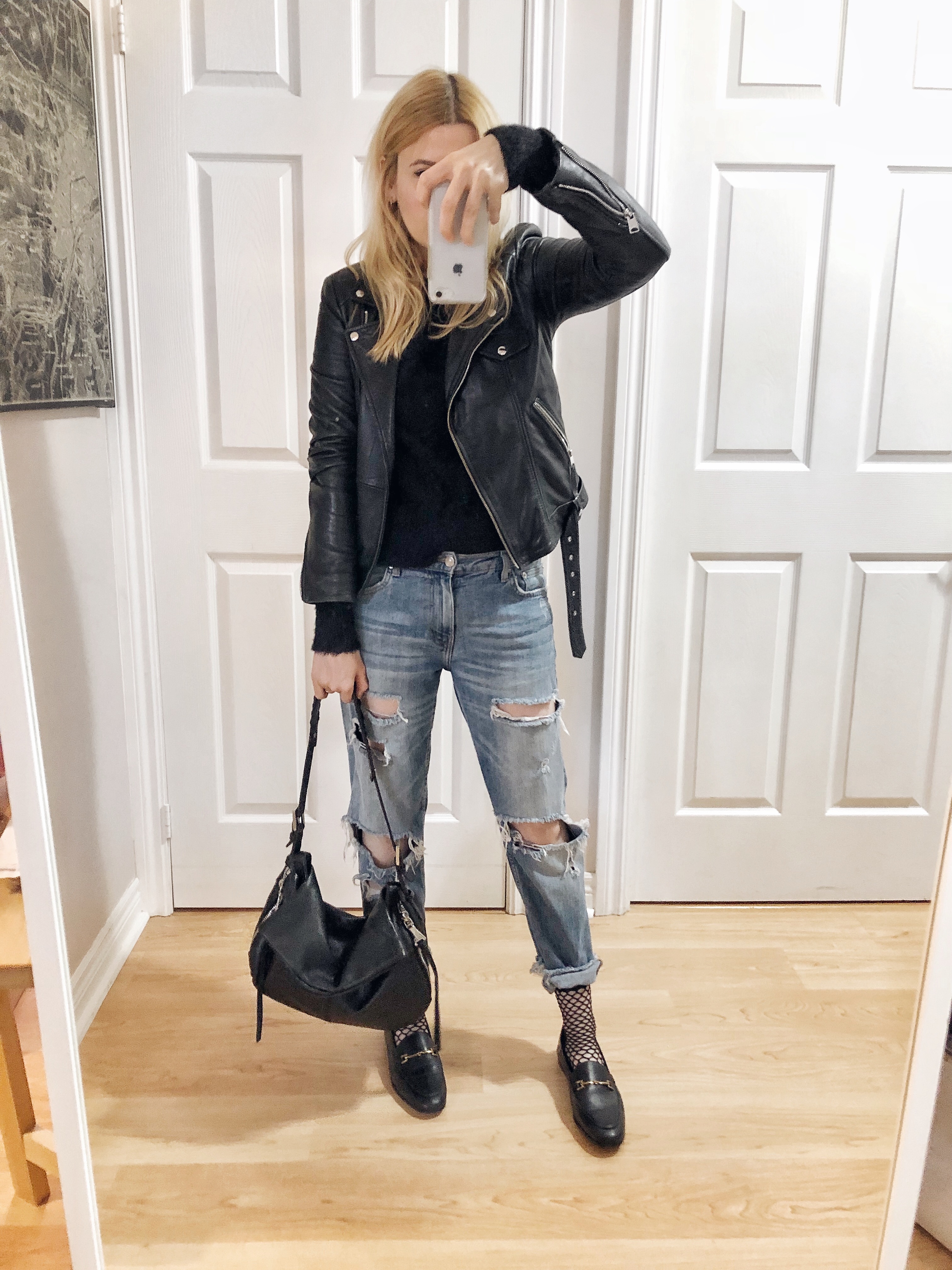 What I wore. A black sweater, moto jacket, with boyfriend jeans, and Sam Edelman Loafers.