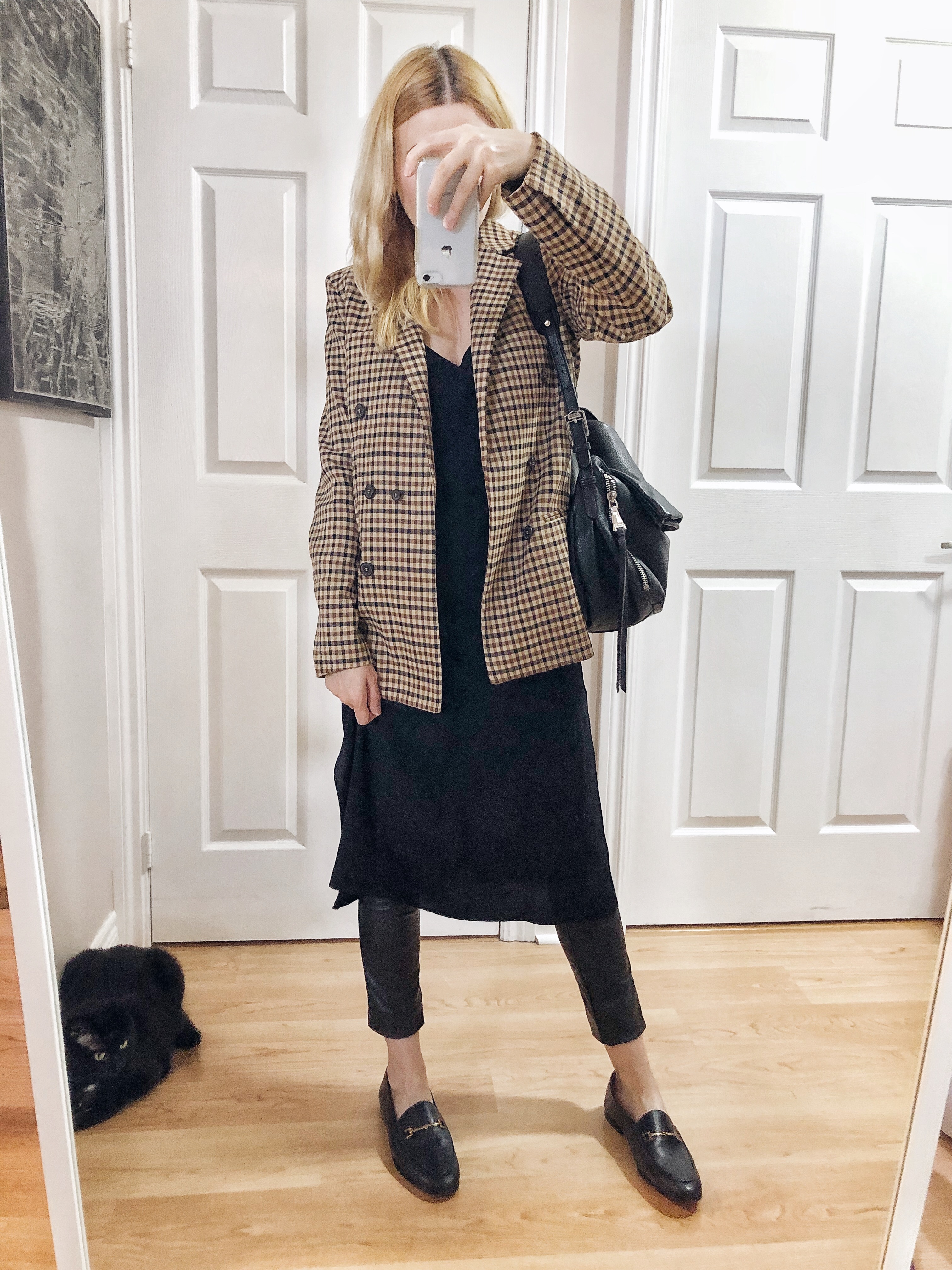 What I Wore. I am wearing a black slip dress, check blazer, black faux leather leggings, and black loafers.