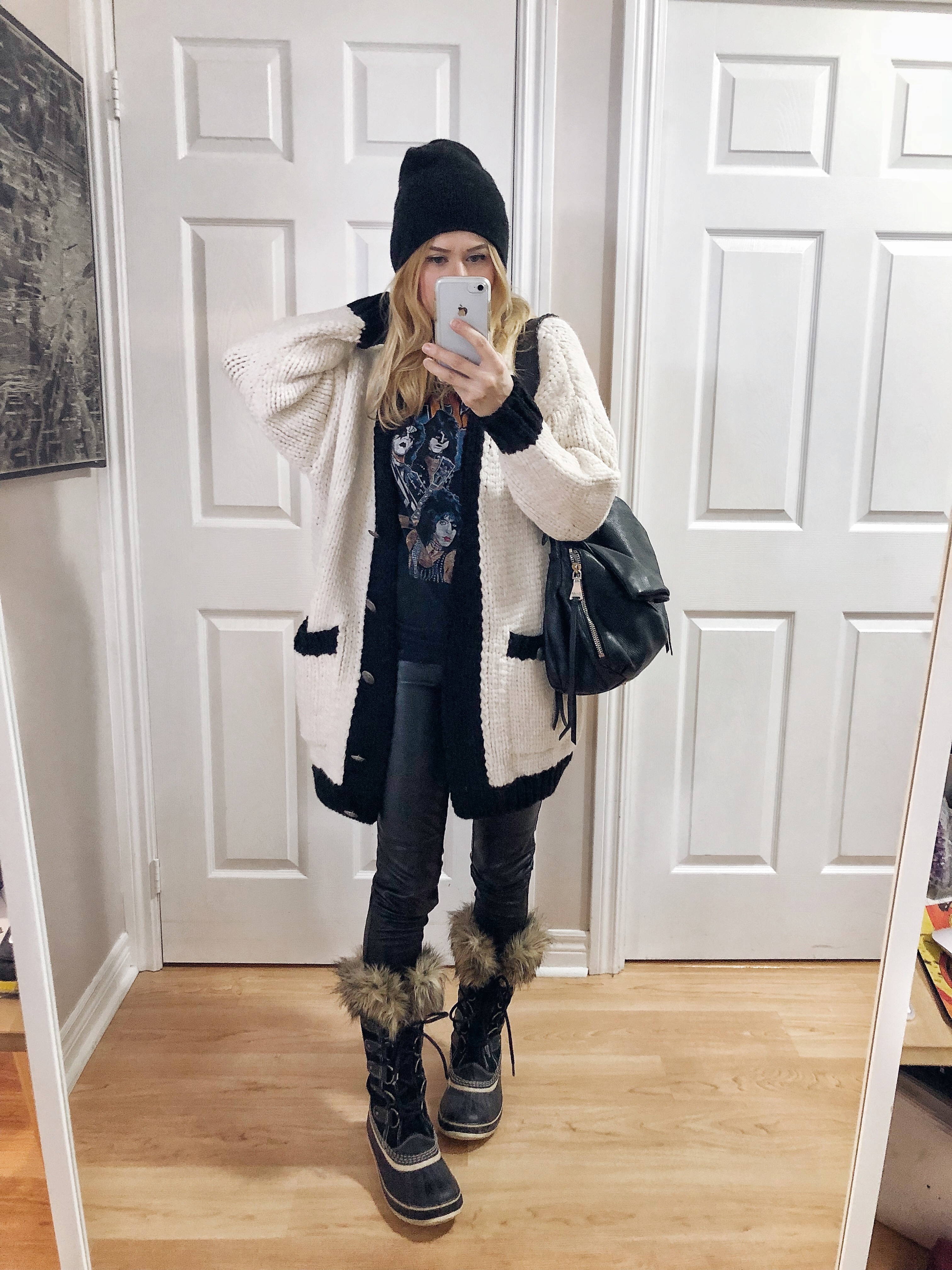 What I Wore. I am wearing a kiss t-shirt, oversized cardigan, black faux leather leggings, and black Sorel Joan of Arctic boots.