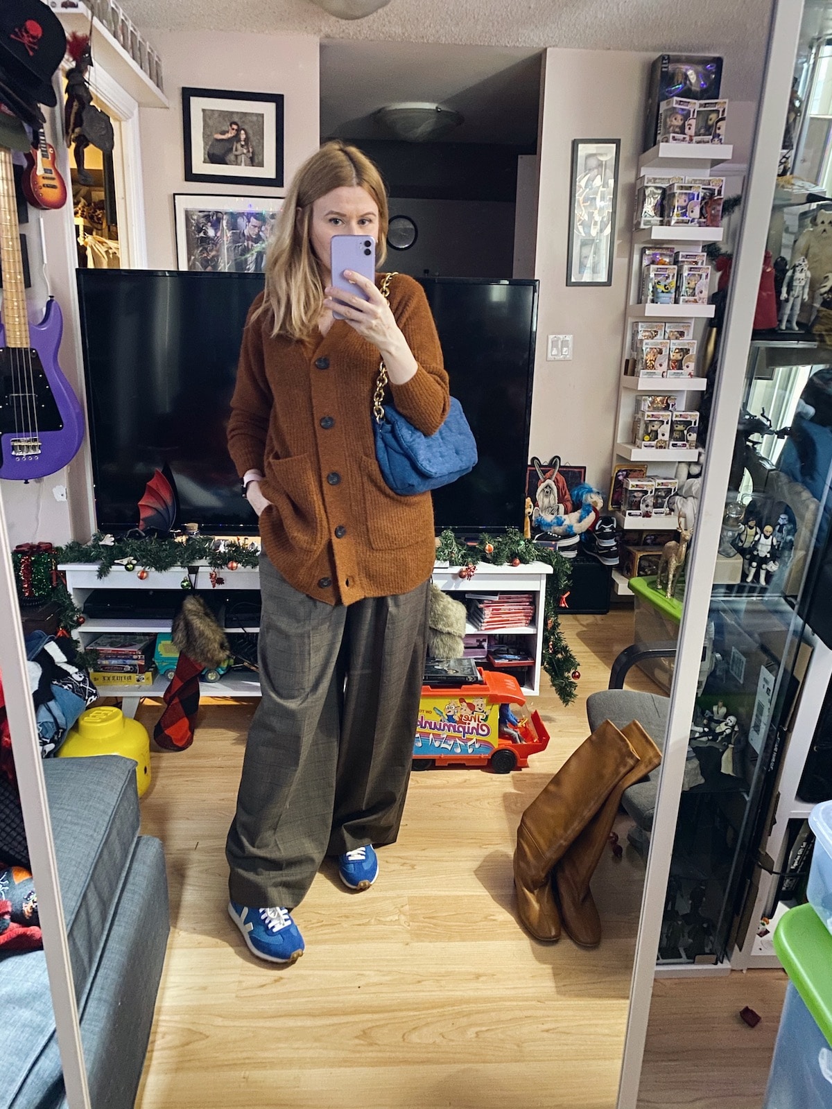 I am wearing an Everlane cardigan, wide leg trousers, Veja sneakers, and a Zara bag.
