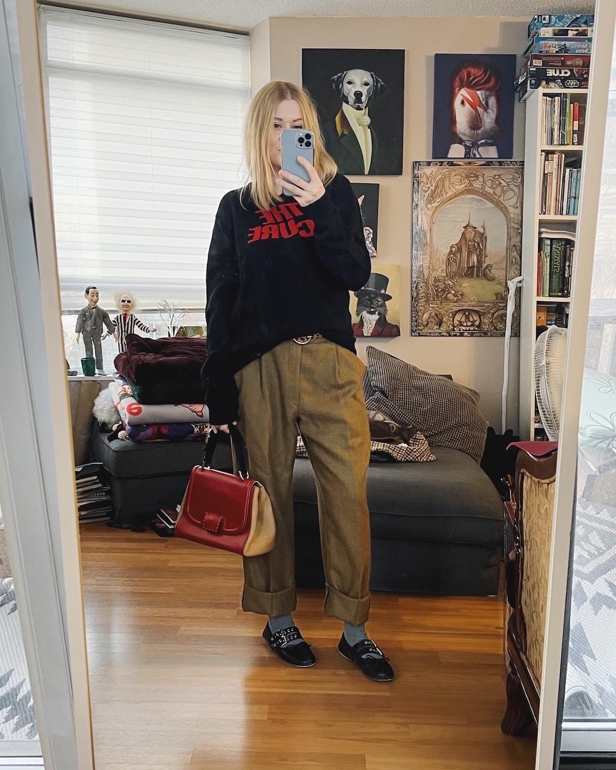 A knit band sweater, vintage trousers, Miu Miu flats, and a vintage Fendi bag.