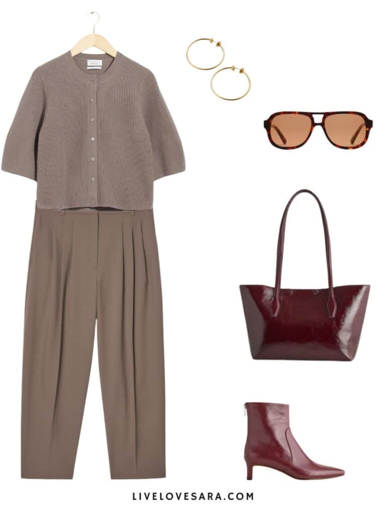 An image of an outfit of a rown short sleeve cardigan, brown trousers, retro sunglasses, hoop earrings, and burgundy boots and tote.