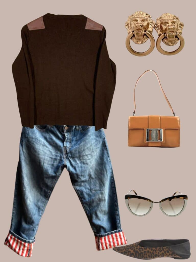 A photo of an outfit of secondhand items. Blue jeans, a brown sweater, door knocker earrings, animal print flats, white cat eye sunglasses, and a tan Ferragamo bag.