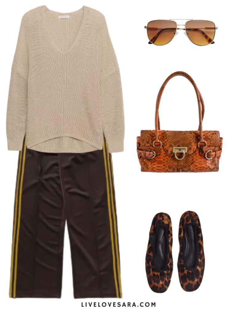 A photo of an outfit of a tan sweater, brown track pants, animal print flats, a snake print bag, and sunglasses.