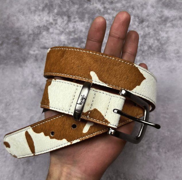 Vintage Stussy cow print belt.