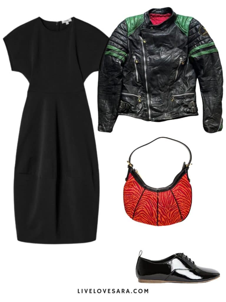 A photo of an outfit of a black sculptural dress, a vintage moto jacket, red handbag, and black oxfords.