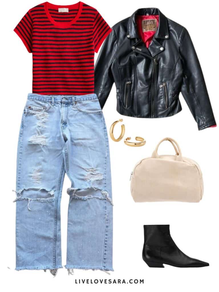 A photo of an outfit of a red and navy striped t-shirt with distressed vintage Levi's, a leather moto jacket, black boots, a cream bag, and fold hoops.