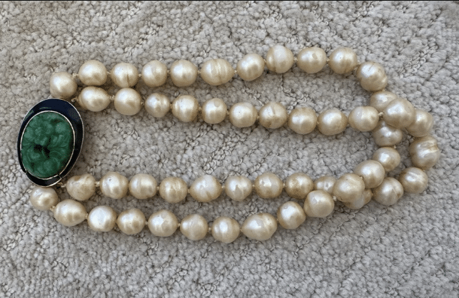 Vintage pearl necklace with jade clasp.