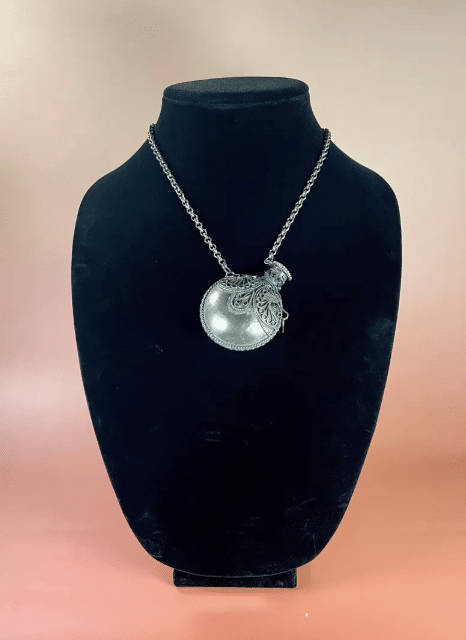 vintage perfume necklace.