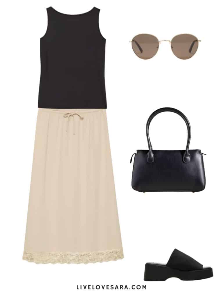 A photo of an outfit of a black tank top, midi skirt, a black bag, sunglasses, and platform slides.