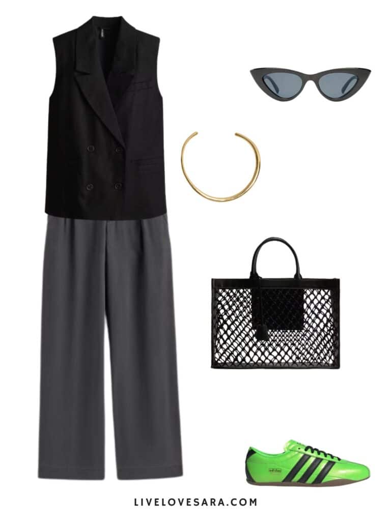 A photo of an outfit of a black vest, grey trousers, green Adidas, a black bag, gold necklace, and cat eye sunglasses.