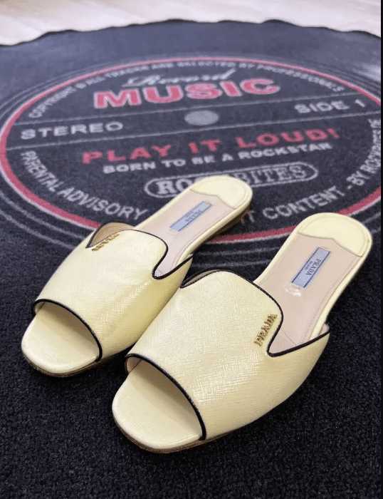 butter yellow vintage Prada mules