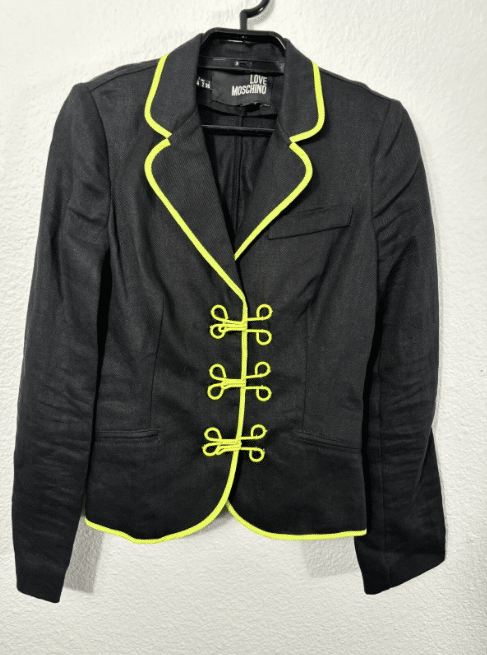 Moschino black blazer with neon piping.