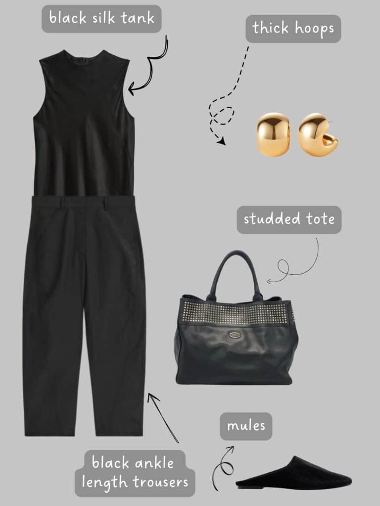A photo of an outfit of a silk blouse, ankle length trousers, gold hoop earrings, a studded tote, and mules.