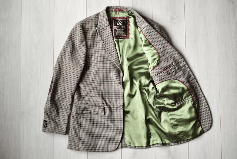 vintage tweed blazer with green lining.