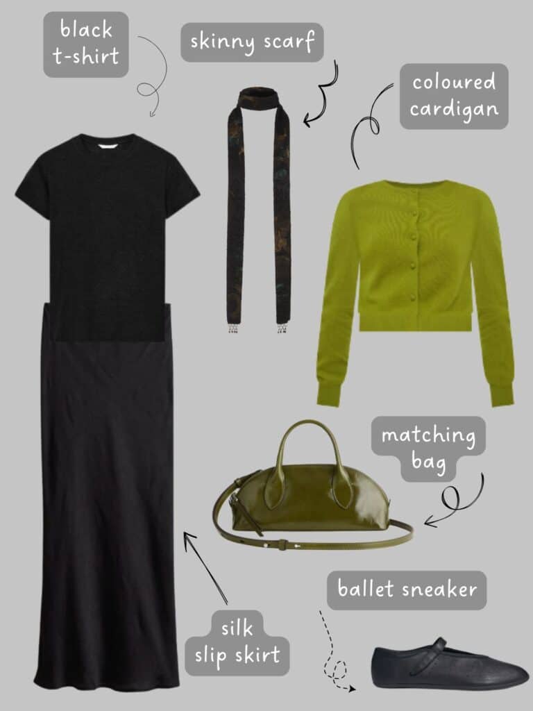 A photo of an outfit of a black tee with a black slip skirt, chartreuse green cardigan, a skinny scarf, green handbag, and black sneakerinas.