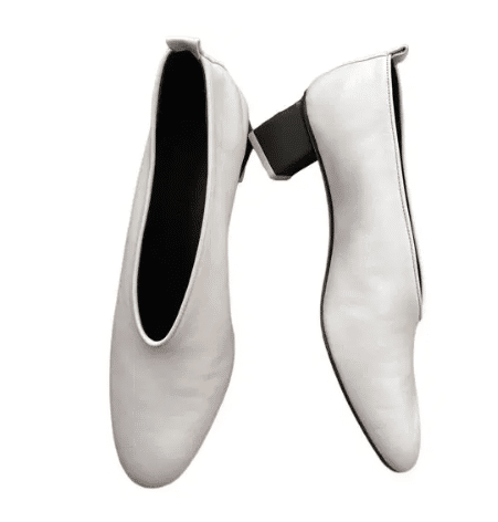white Leather heels with high vamp.