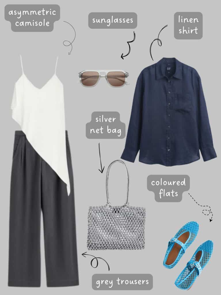 A photo of an outfit of a white asymmetrical camisole with grey trousers, a navy blue linen shirt, silver net bag, grey sunglasses, and blue mesh flats.