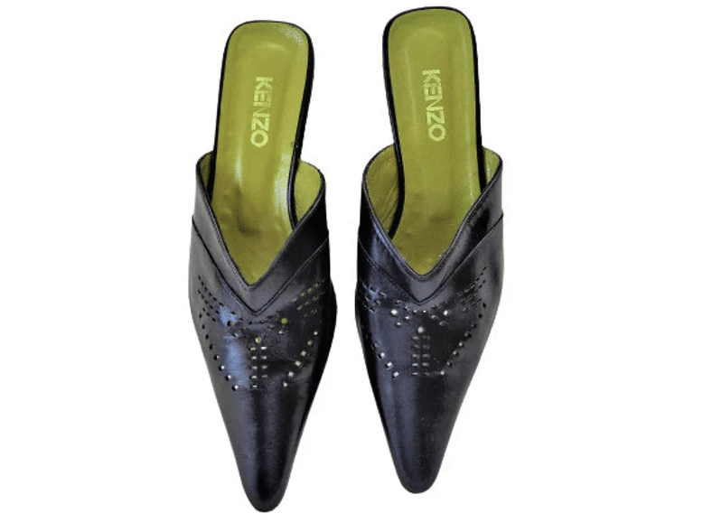 Kenzo black leather mules with green insoles.