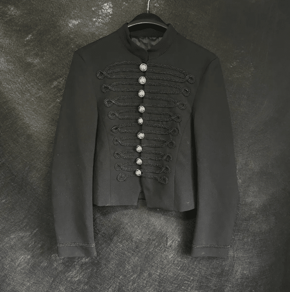black napoleon jacket with silver tone buttons