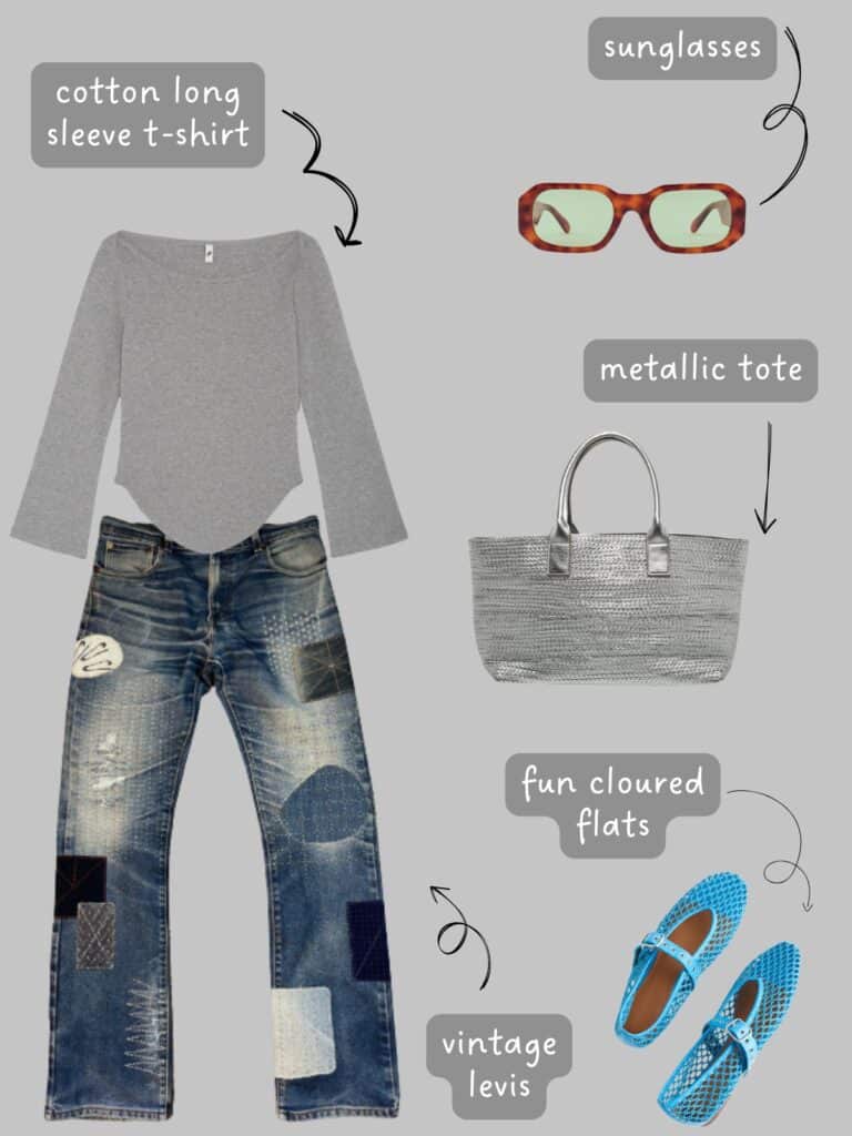 A photo of an outfit of a grey raglan t-shirt with Sashiko Patchwork vintage levi's, blue woven mary janes, a silver tote, and green lens sunglasses.