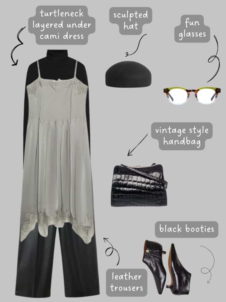 A photo of an outfit of a black turtleneck and leather trousers layered under a grey cami dress, a black sculpted hat, glasses, a vintage style croc embossed bag, and black booties.
