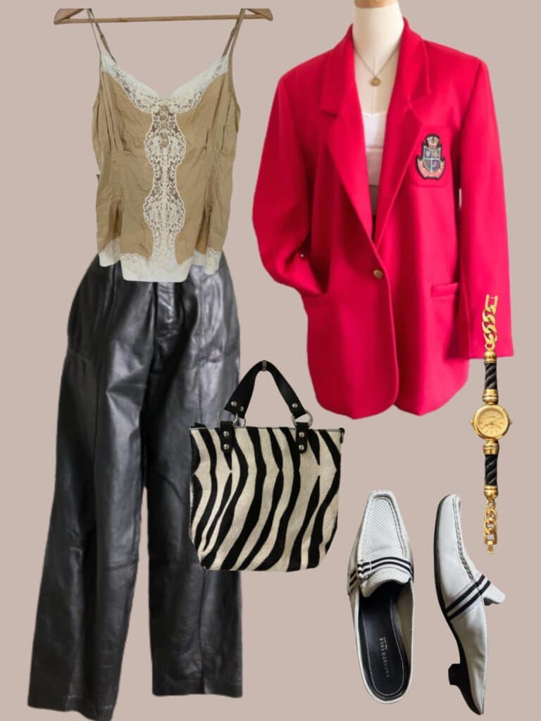 An image of an outfit of a silk tan camisole with wide leg black leather pants. A red wool vintage Ralph Lauren collegiate blazer, a zebra print bag, a gold tone vintage watch, and white sporty loafer mules with kitten heels.