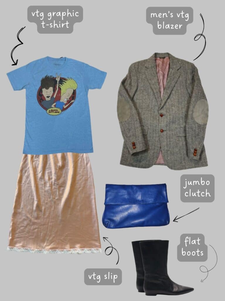 A photo of an outfit of a Beavis and Butthead blue t-shirt with a pink vintage slip, a men's blazer, large cobalt blue clutch, and black flat boots.
