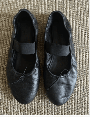 Marni black leather ballet shoes with wide elastic strap.