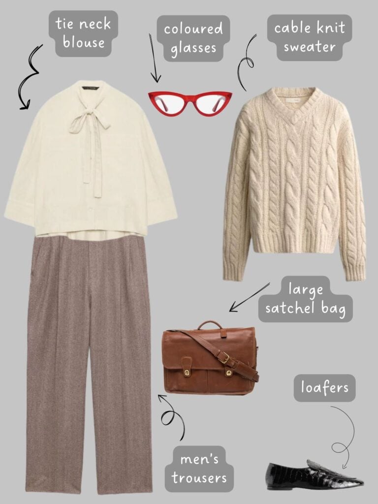 A photo of an outfit of a cream tie neck blouse layered under a cream men's cable knit sweater, men's brown houndstooth trousers, red glasses, a brown leather satchel bag, and black croc embossed loafers.